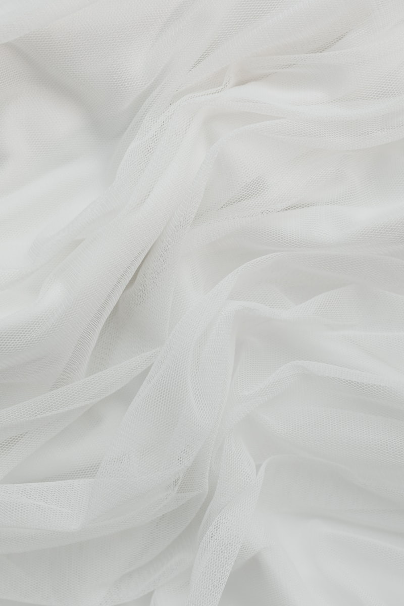 Choosing the Right Fabric for Your Custom Wedding Dress: A Complete Guide